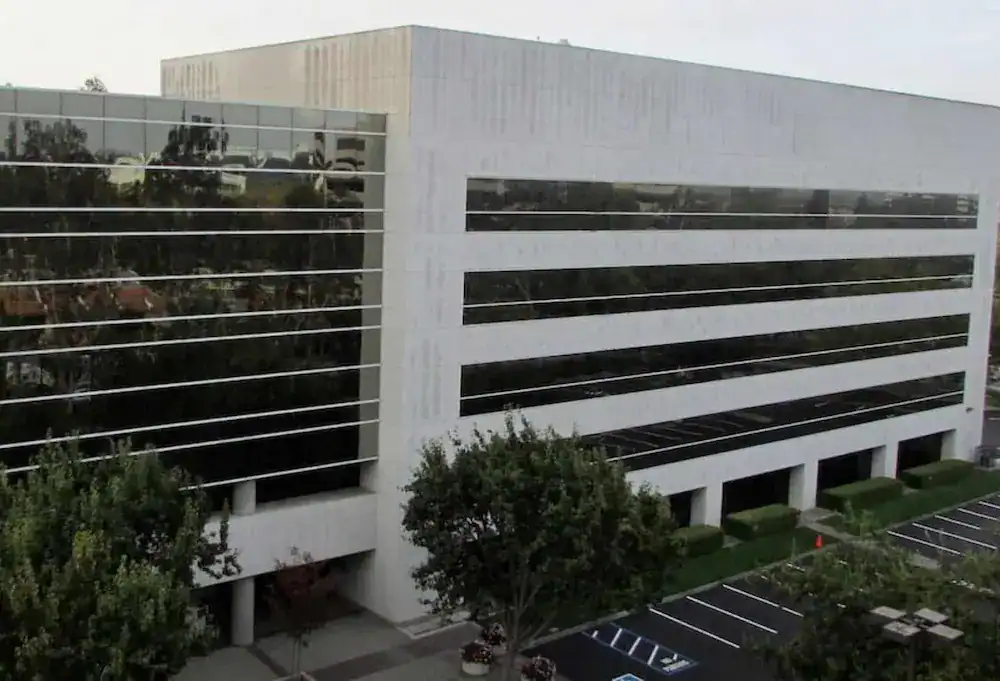 Commercial building exterior before cleaning — pacific exterior