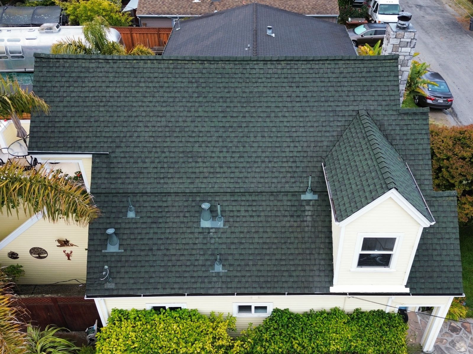 Roof after professional cleaning, showcasing a clean surface free of moss and algae, demonstrating the effectiveness of roof cleaning services.