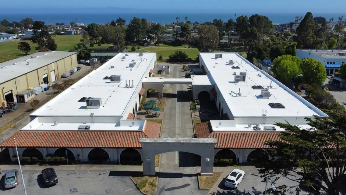 Aerial view of commercial single-ply membrane roof cleaning — santa cruz — pacific exterior