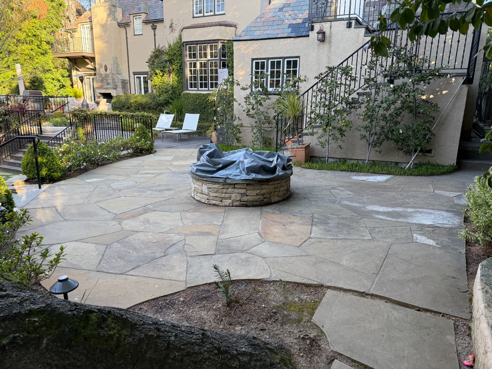 Stone patio firepit landscaping